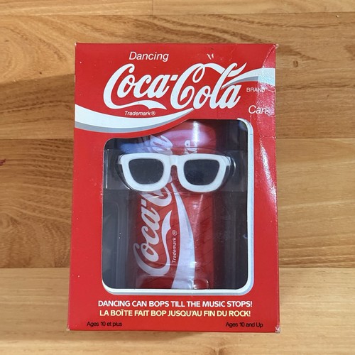Lattina coca cola - lattina, danzante