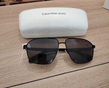 OCCHIALI DA SOLE CALVIN KLEIN DA UOMO COLORE NERO LENTI NERE ARTICOLO CKJ24202S