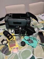 set macchina fotografica Yashica FX-3 super 2000 completa di borsa ed accessori.