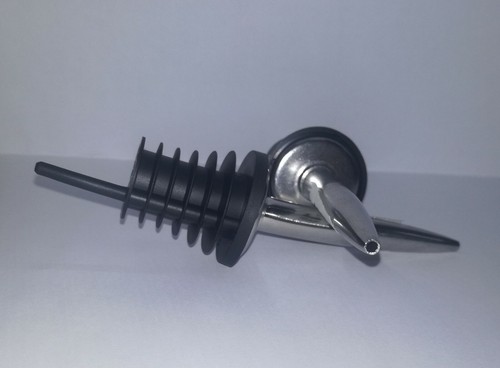 Tappo dosatore versatore punta - dosatore,