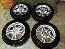 4 gomme pneumatici con cerchi