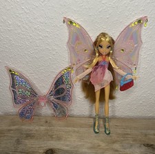 Bambola Winx Club Flora Glam Magic Enchantix di Mattel