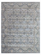 Tappeto trapuntato a mano