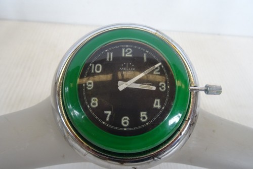 Pulsante clacson con orologio