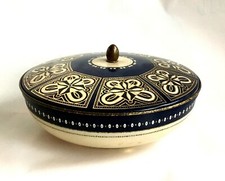Scatola in latta tonda blu e bianca da collezione vintage