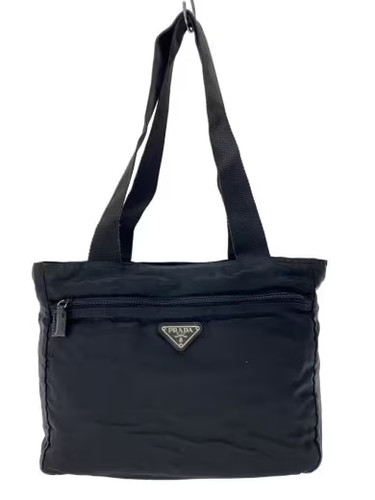 Prada manici mostrano segni - /,