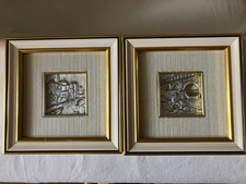 coppia di quadretti con paesaggi in lamina d'argento sbalzato