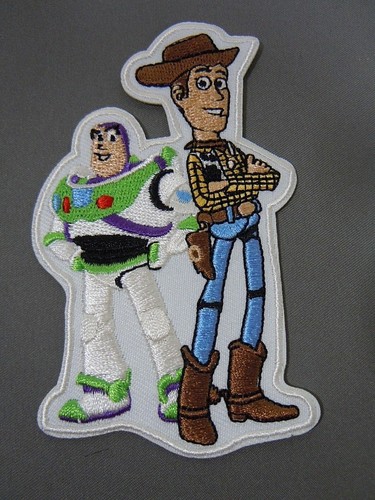 Buzz lightyear and woody - buzz,