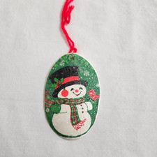 Targa pupazzo di neve vintage