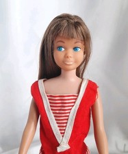 Barbie Skipper Mora Con