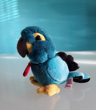 "TRUDI" peluche Pappagallo, colore turchese e nero, altezza 14 cm.