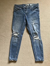 Jeans skinny strappati pull