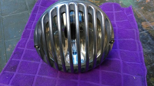Faro moto con griglia - faro,