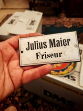 Antica insegna in latta