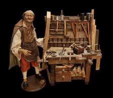 Pastore  falegname con banco
