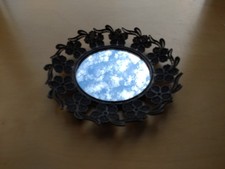 Antico specchio tondo in