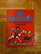 DIE SCHLÜMPFE bauen eine