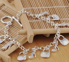 BRACCIALE 20 CM CON CIONDOLI COLORE ARGENTO 925