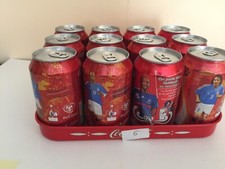 COCA COLA  LOTTO 12 LATTINE  MISTE SIGILLATE E  SVUOTATE DAL FONDO