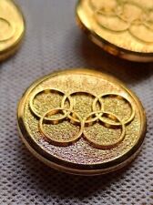 OLIMPIADI , cerchi olimpici, bottone dorato, gadget