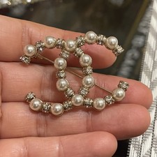 Spilla CHANEL tono oro perla