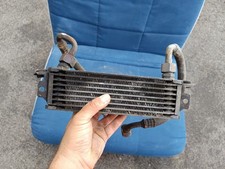 Radiatore olio con tubi per Fiat Uno Turbo i.e. 1.3, 1.4, originale. [591.25]