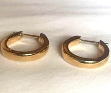 Orecchini Huggie a cerchio