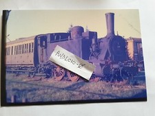 Fotografia Carrozza Centoporte a 3 assi tipo Dy 67.061 con Locomotiva FS 851.057