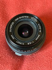 OLYMPUS ZUIKO 24mm f/2.8 comme