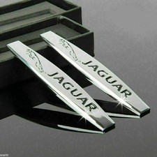 2 emblemi Jaguar in argento