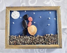 Quadretti realizzati con sassi