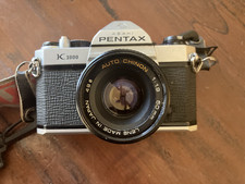 Pentax K 1000 SE fotocamera reflex pellicola con 50mm F 1.7 funzionante bene e pronta all'uso
