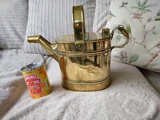 Antico annaffiatoio in ottone