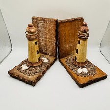 Fermalibri faro rustico legno