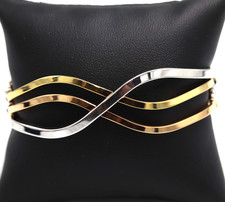 Bracciale a manetta due ori in