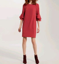 Abito con à jour e volant