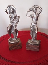 COPPIA DI SCULTURE IN PELTRO