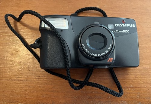 Olympus infinity zoom - olympus,