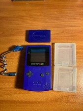 Game Boy Color viola con luce da attaccare e custodie per cartucce 