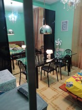 Tavolo LC6 Le Corbusier+6 Sedie In Pelle Nera Di Matteo Grassi Edizione Cassina.