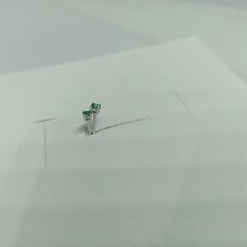 Orecchini punto luce in oro bianco  18 kt  con smeraldi ct 0,12.