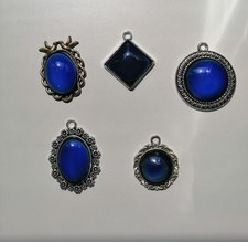 Collana,bracciale o anello con ciondolo che cambia colore secondo  l'umore 