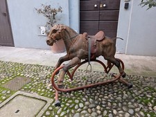 cavallo a dondolo in lamiera vintage