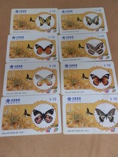 Cina 8 schede telefoniche ricarica "Farfalle" (Integre)