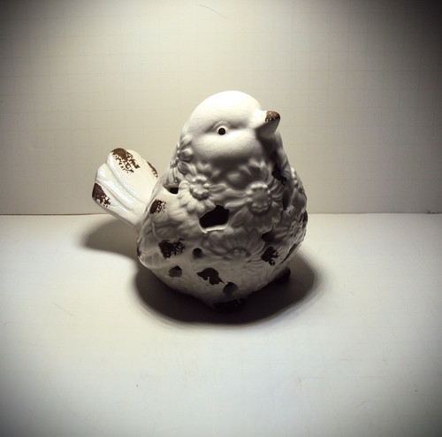 Scultura uccellino ceramica