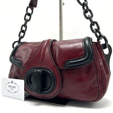 Borsa a tracolla PRADA catena borsa a mano Turnlock pelle vino rosso