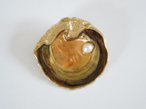 Spilla moda color oro con - di,