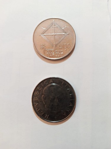 Due monete 100 lire - due,