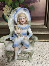 Antica statuina in porcellana