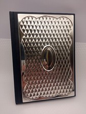 Agenda telefonica blu con copertina in argento,da fondo di magazzino 